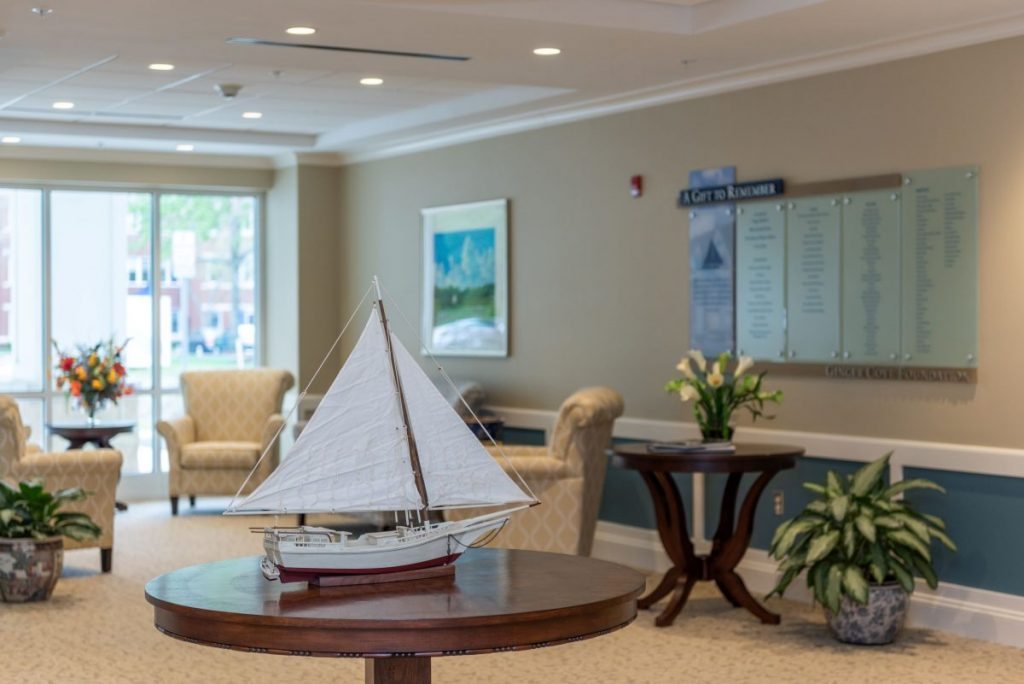Ginger Cove Independent Living table display with ship