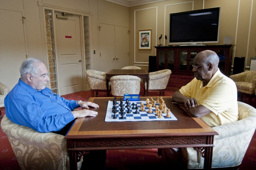 Ginger Cove residents playing chess