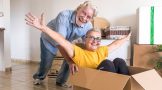 Senior couple packing for a move