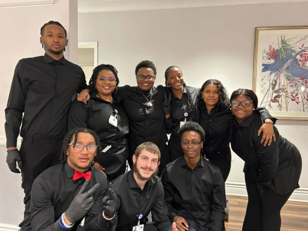 Smiling group of Ginger Cove employees