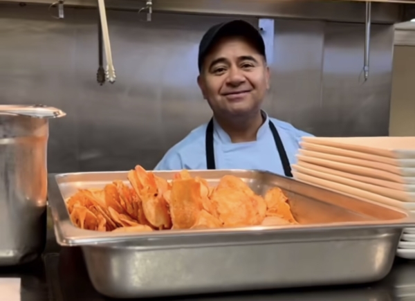 Ginger Cove kitchen employee smiling