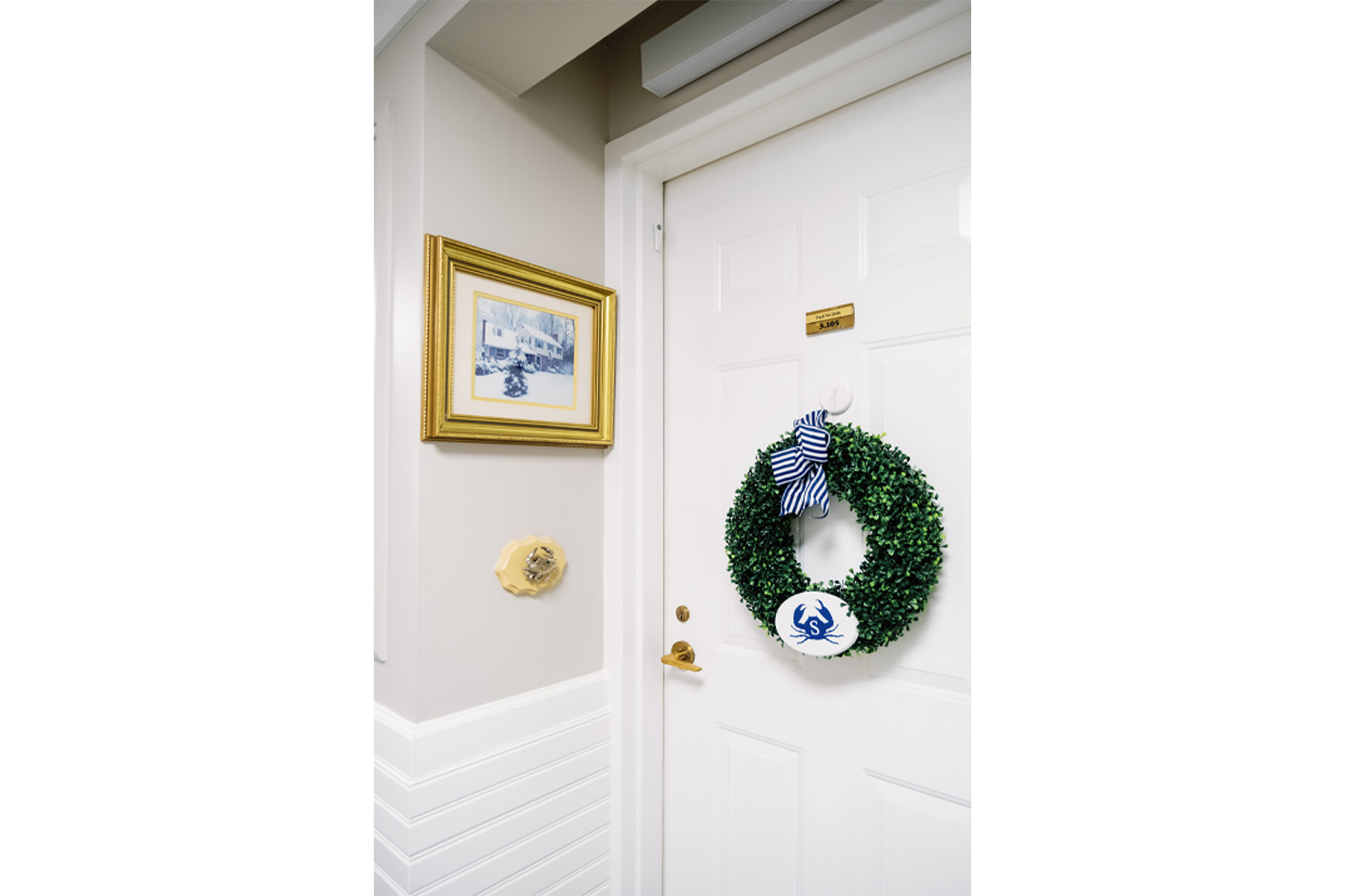 Ginger Cove resident apartment entryway with wreath