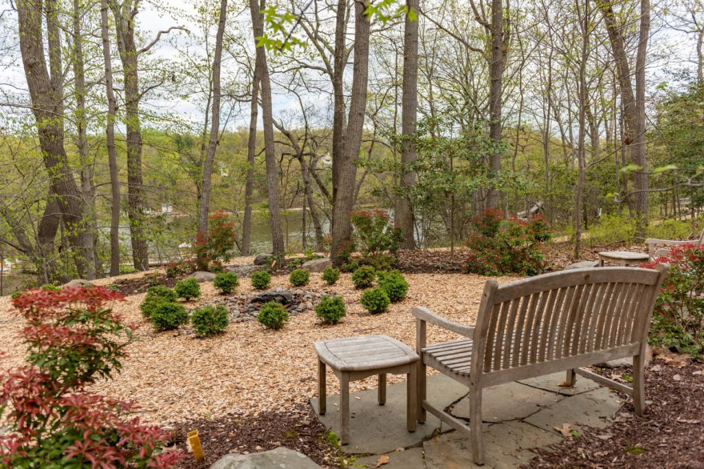 Ginger Cove bench facing Gingerville Creek